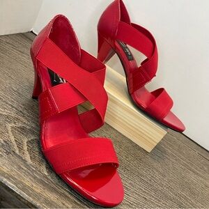 AJ Valenci patent leather Strappy Heels. Size 7.5 W. Pre-owned. Some scratches.